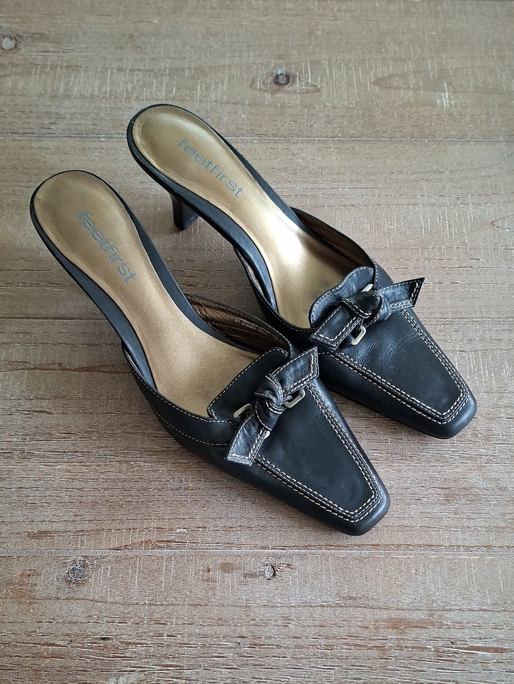 Black Leather Mule Heels with Knot Detail